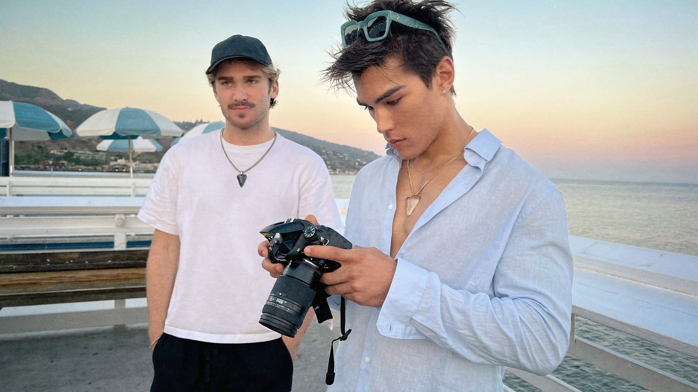 The founders on the pier at golden hour